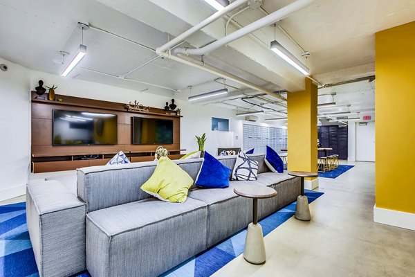 Clubhouse and lobby area featuring modern design and seating at Park Plaza Apartments