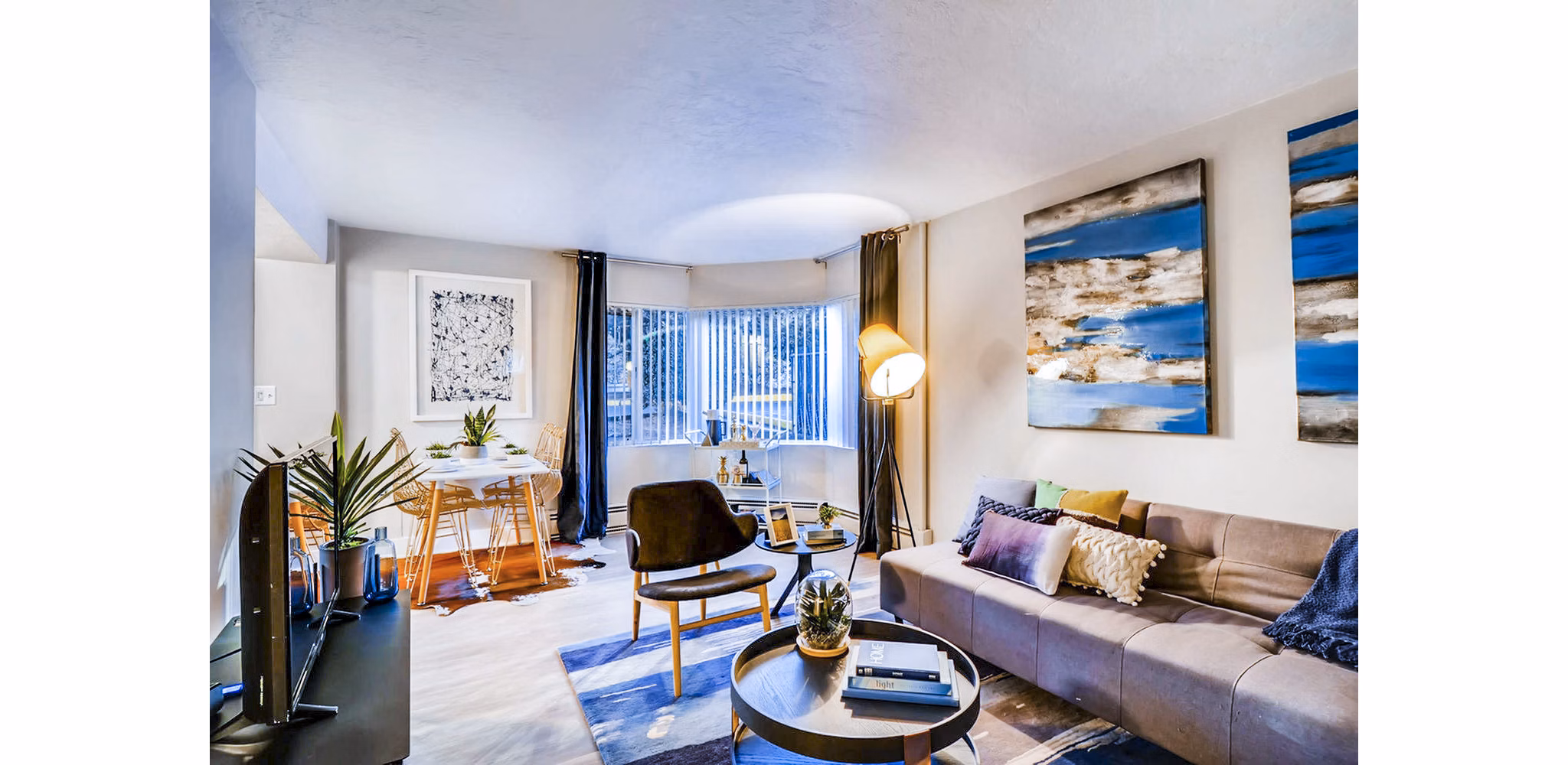 Living room with modern furnishings at Park Plaza Apartments
