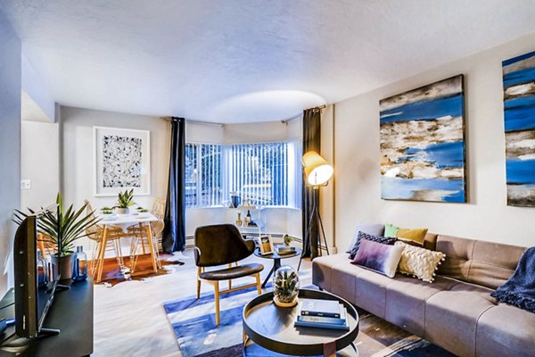 Living room with modern furnishings at Park Plaza Apartments
