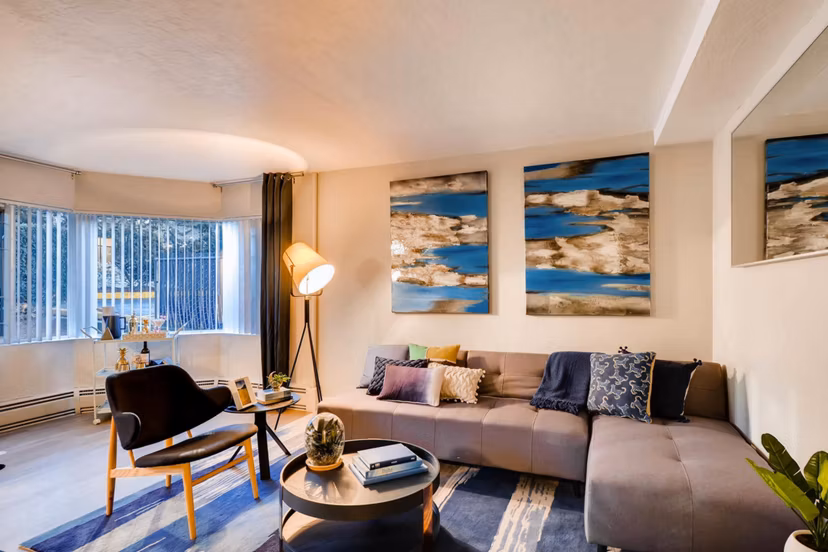 Spacious living room with modern decor at Park Plaza Apartments, a Greystar luxury property