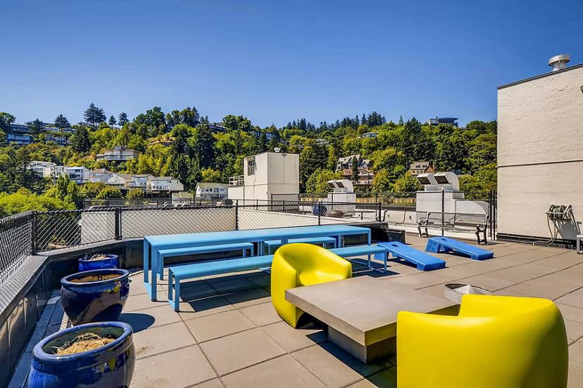 Charming patio with elegant furniture at Park Plaza Apartments, perfect for outdoor relaxation in a luxurious setting