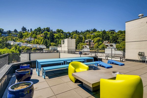 Charming patio with elegant furniture at Park Plaza Apartments, perfect for outdoor relaxation in a luxurious setting