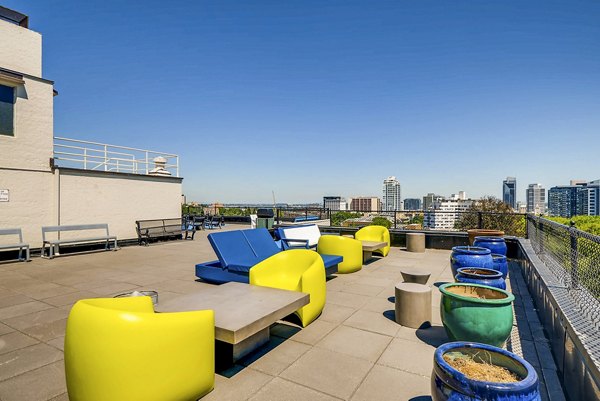 Spacious patio with modern furnishings at Park Plaza Apartments