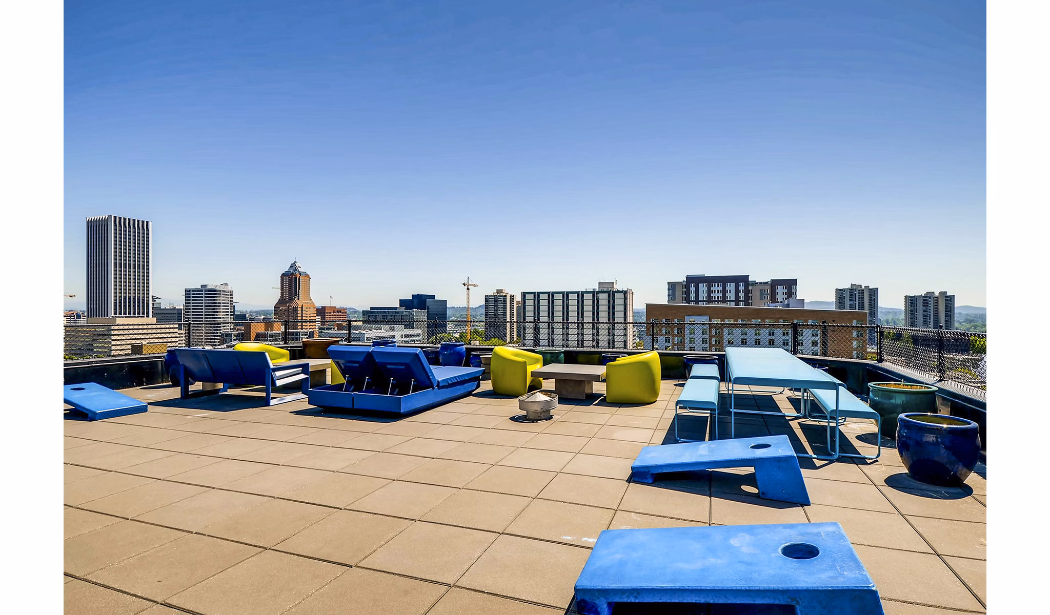 Cozy outdoor patio with seating and plants at Park Plaza Apartments, luxury living