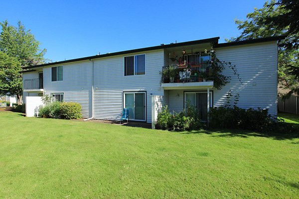 Redwood Park Apartments: Elegant design with lush landscaping in a serene residential setting