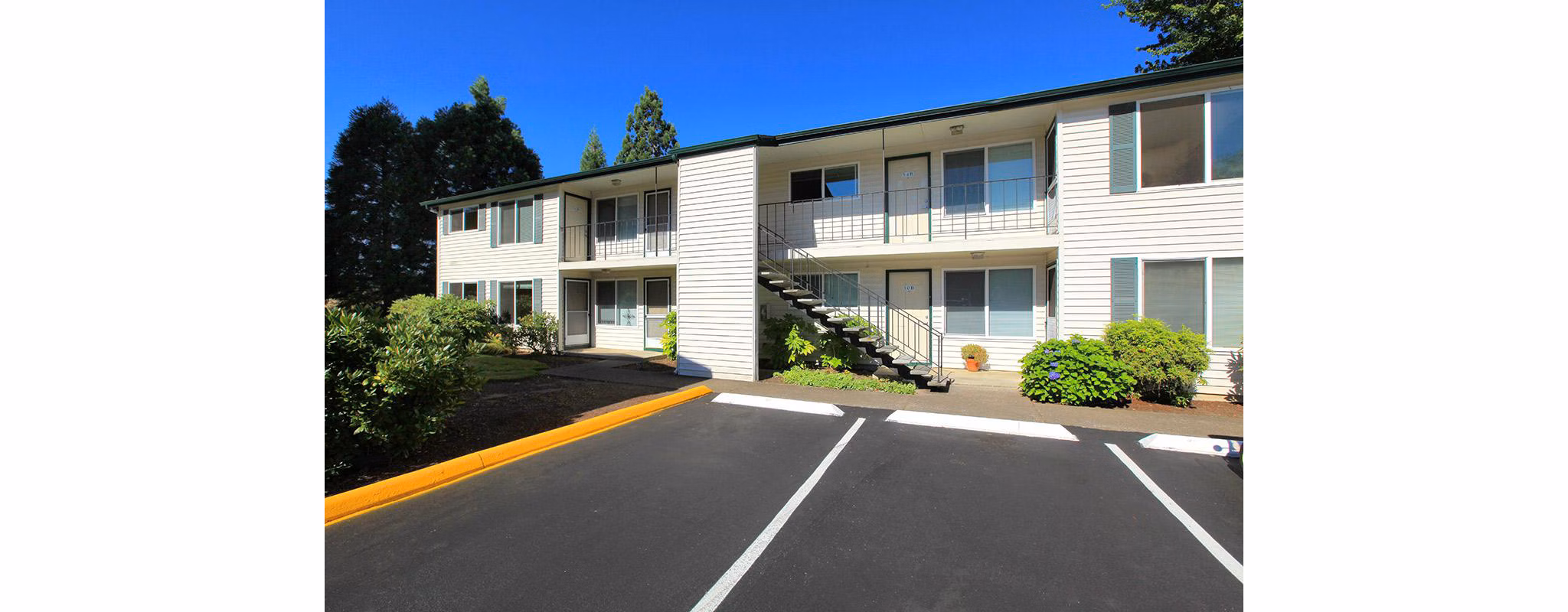Redwood Park Apartments: Modern garden-style luxury apartments amidst lush greenery