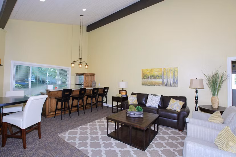 Clubhouse with modern design and spacious seating areas at Redwood Park Apartments