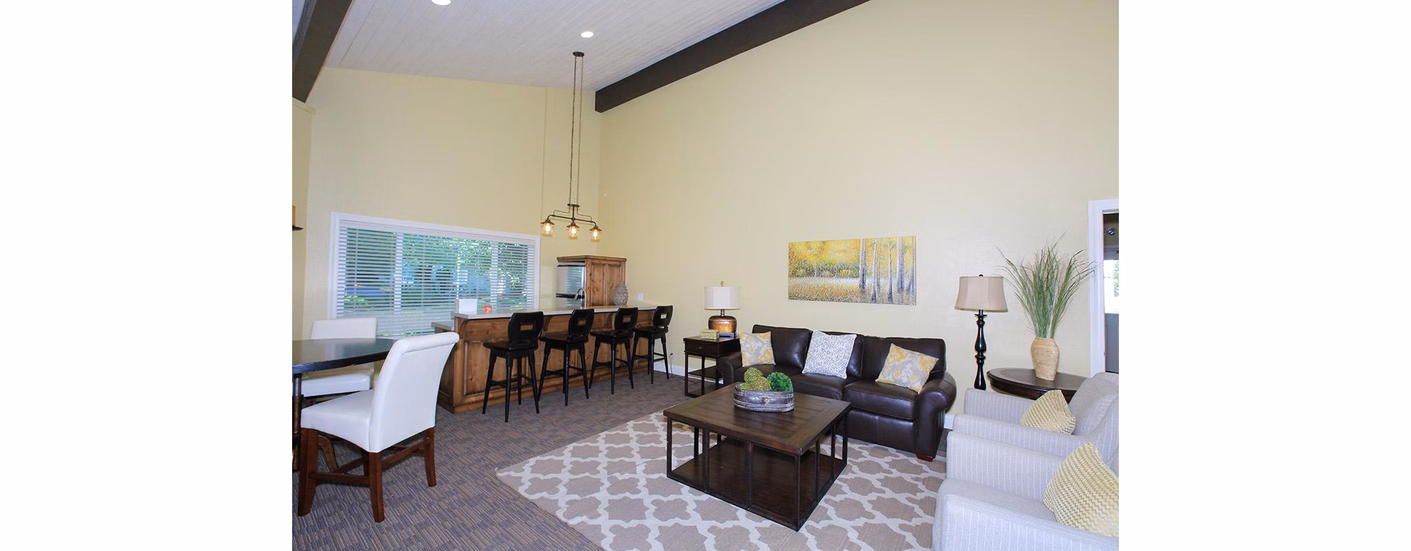 Clubhouse with modern design and spacious seating areas at Redwood Park Apartments
