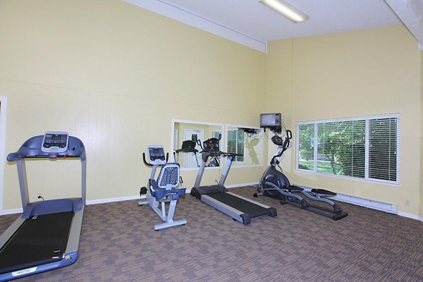 Fitness room with modern equipment at Redwood Park Apartments