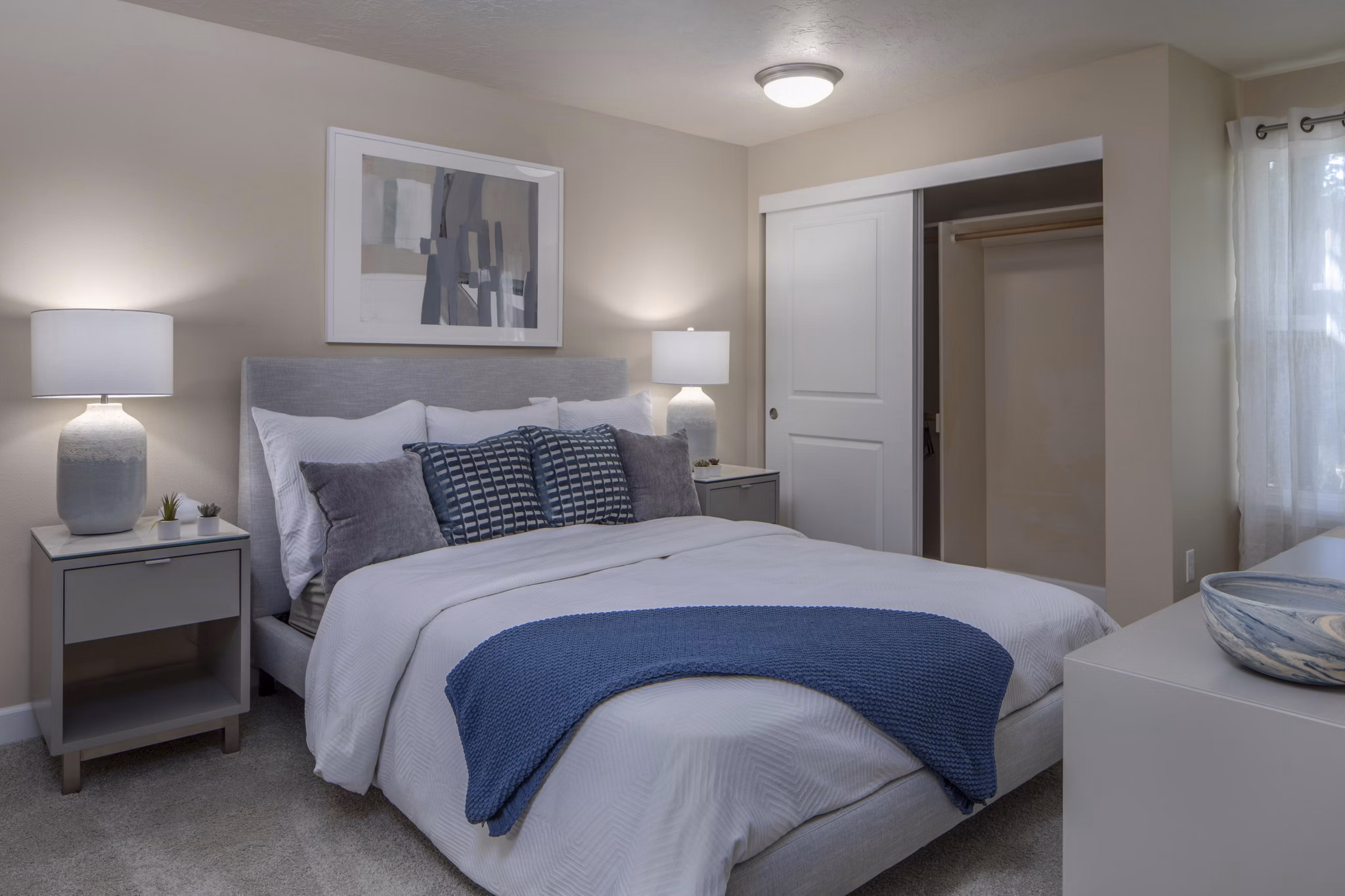 Cozy bedroom with elegant decor at Sorrento Bluff Apartments
