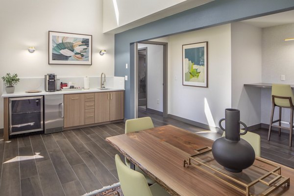 Clubhouse lobby with modern seating and bright lighting at Sorrento Bluff Apartments, offering a welcoming community space