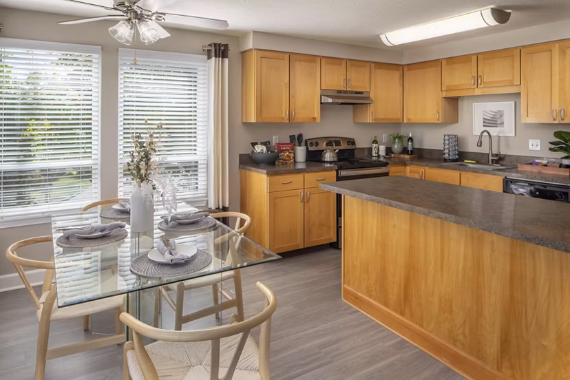 Dining room featuring elegant lighting and modern furnishings at Sorrento Bluff Apartments