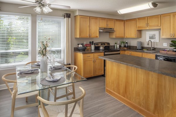 Dining room featuring elegant lighting and modern furnishings at Sorrento Bluff Apartments