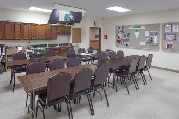Meeting facility ideal for conferences at Summerfield Apartments: equipped with modern technology and spacious seating for events and gatherings