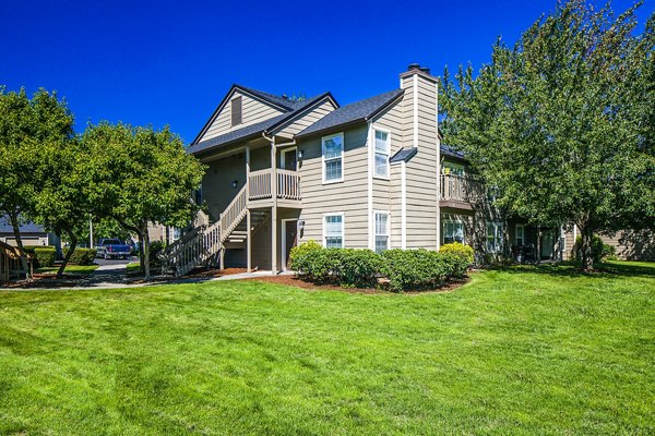 Village at Cascade Park: Contemporary apartment building with landscaped gardens in a vibrant community setting