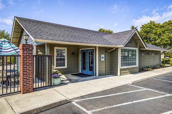 Clubhouse featuring modern amenities at Village at Cascade Park Apartments