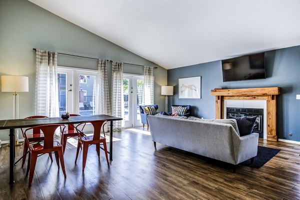 Clubhouse lobby featuring modern seating and decor at Village at Cascade Park Apartments