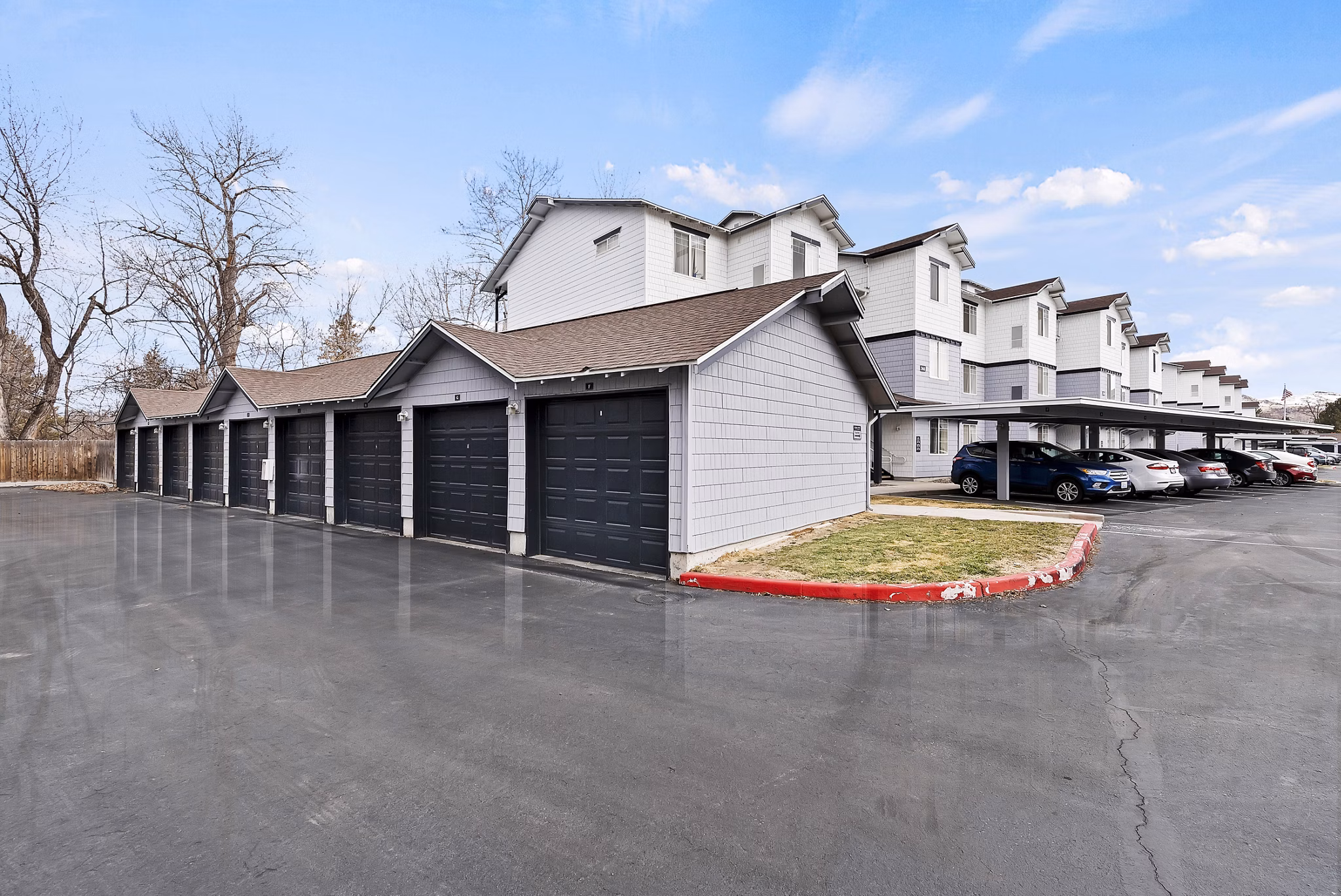 Logger Creek at Parkcenter: Covered parking garage available at luxury apartments in prime urban location