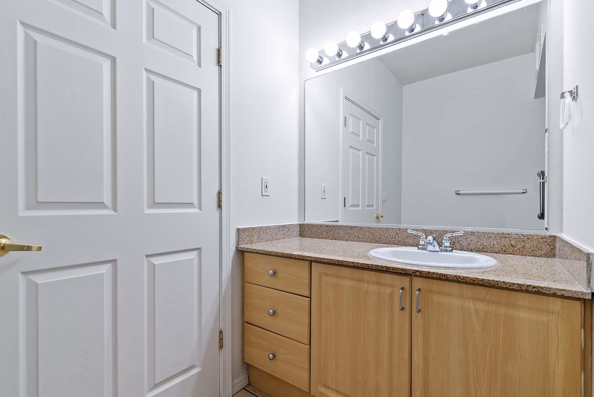 Luxurious bathroom featuring modern fixtures at Logger Creek at Parkcenter Apartments