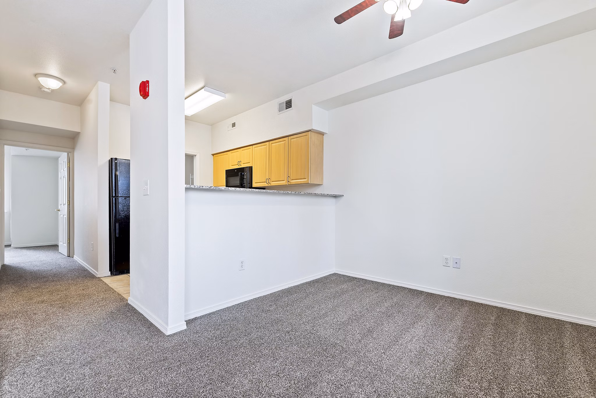 Dining room showcasing modern furnishings at Logger Creek at Parkcenter Apartments in Boise, offering a luxurious living experience