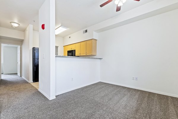 Dining room showcasing modern furnishings at Logger Creek at Parkcenter Apartments in Boise, offering a luxurious living experience