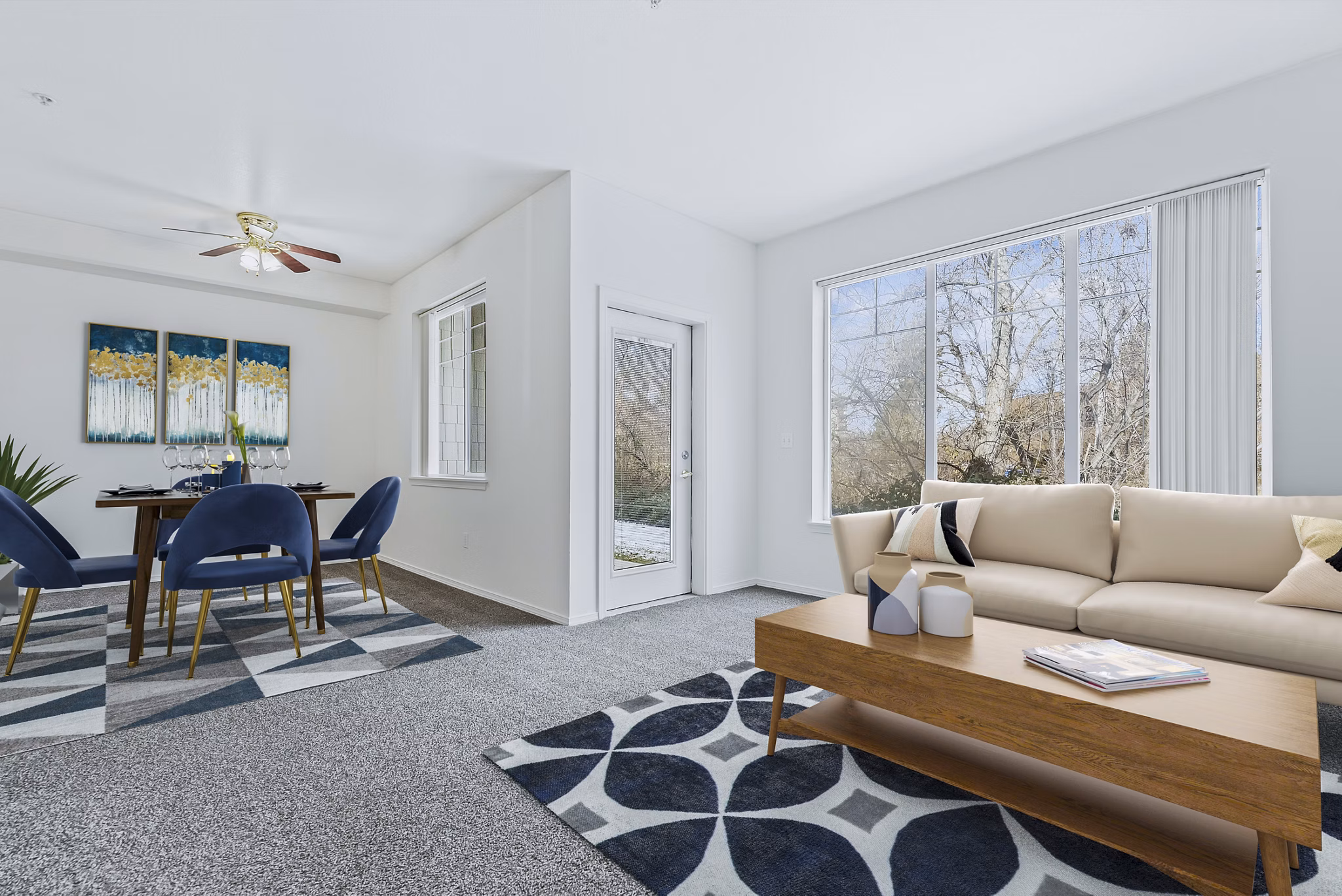Spacious living room with modern decor at Logger Creek at Parkcenter Apartments