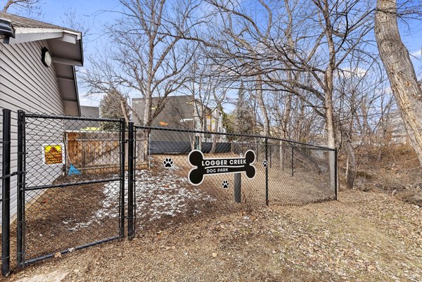 dog park at Logger Creek at Parkcenter Apartments