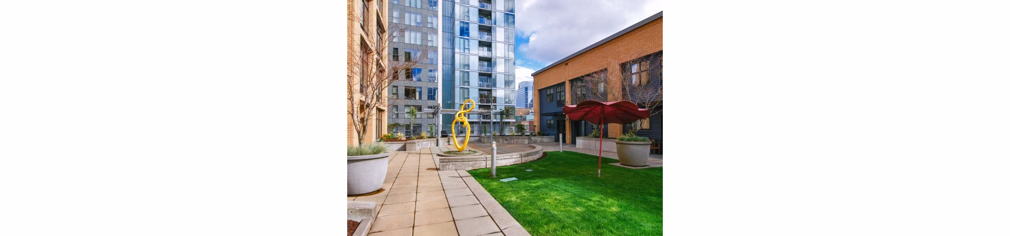 Clubhouse featuring modern lounge and conference area at Museum Place Apartments, a luxury community by Greystar