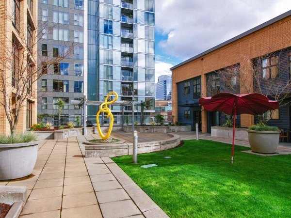 Clubhouse featuring modern lounge and conference area at Museum Place Apartments, a luxury community by Greystar