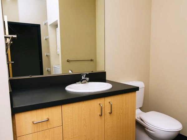 Modern bathroom with sleek finishes at Museum Place Apartments
