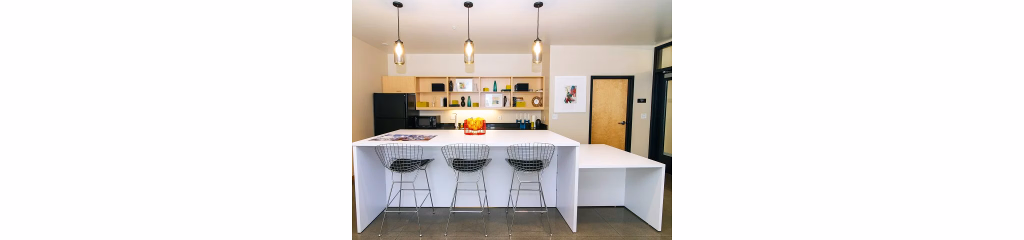 Clubhouse featuring modern furnishings and social spaces at Museum Place Apartments, luxury Greystar community in downtown location