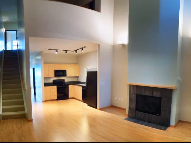 Modern kitchen with stainless appliances at Museum Place Apartments