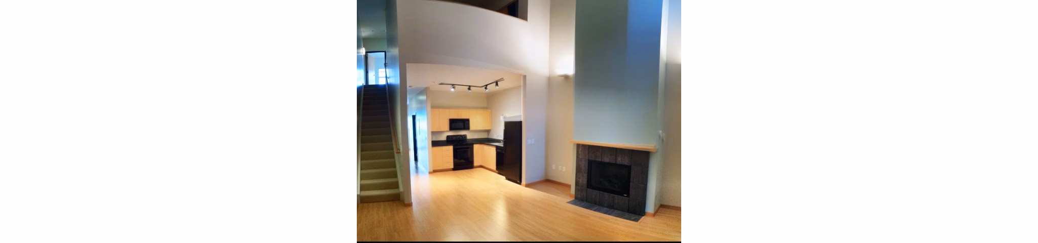 Modern kitchen with stainless appliances at Museum Place Apartments