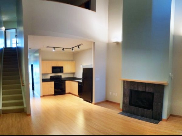 Modern kitchen with stainless appliances at Museum Place Apartments