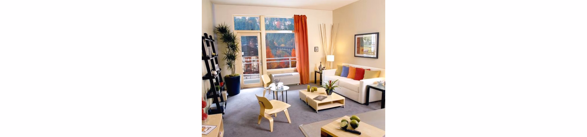 Modern living room with elegant decor at Museum Place Apartments, featuring spacious layout and natural light