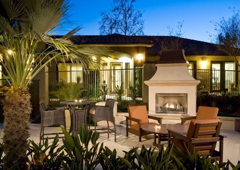 Cozy patio area with modern seating at Castlerock Apartments, perfect for relaxation and social gatherings