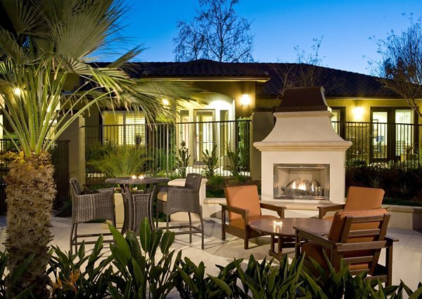 Cozy patio area with modern seating at Castlerock Apartments, perfect for relaxation and social gatherings
