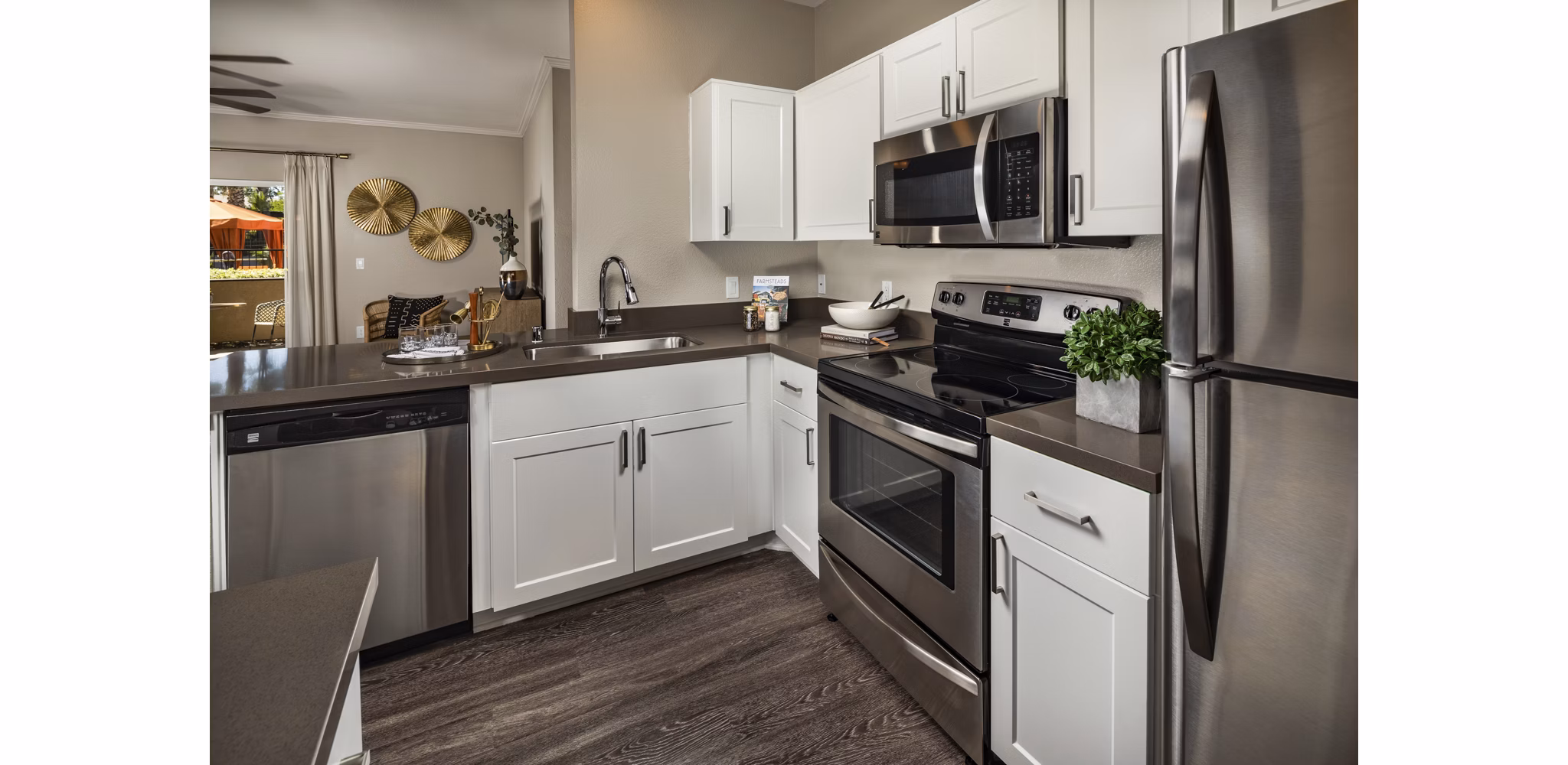 Modern kitchen with stainless steel appliances at Colonnade Apartments, Greystar luxury apartments in prime location