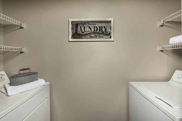 laundry room at Colonnade Apartments