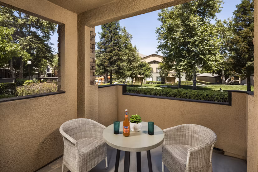 Patio with modern outdoor seating at Colonnade Apartments