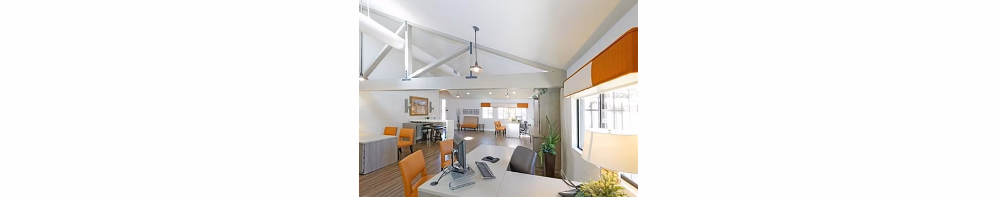 La Vista Apartments: Modern clubhouse with spacious seating areas and stylish decor