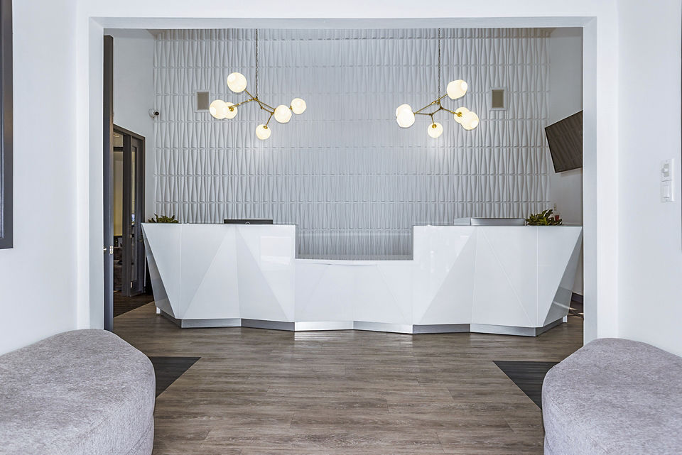 Clubhouse featuring modern design and comfortable seating at Enclave Apartments