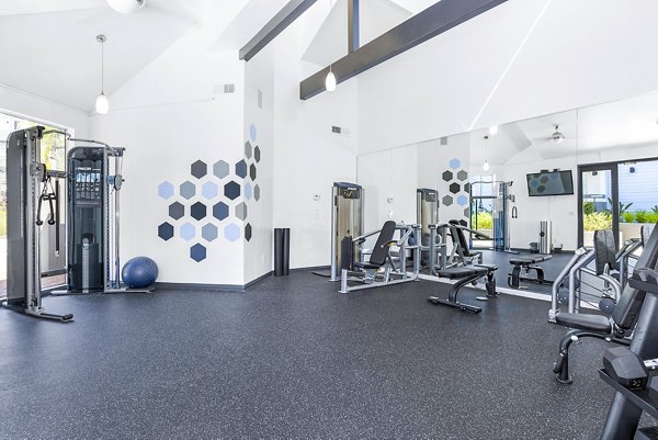 fitness center at Enclave Apartments