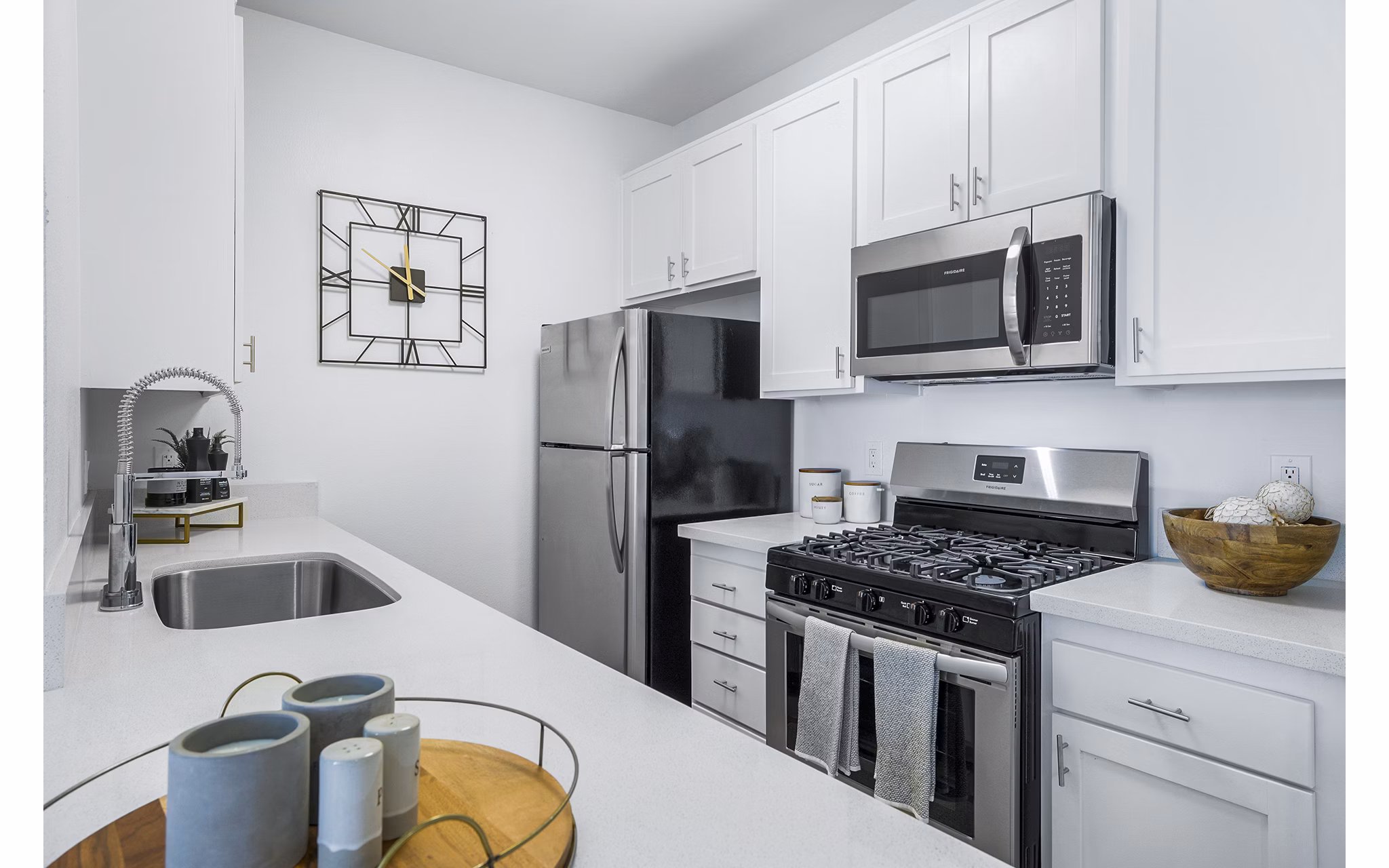 Modern kitchen with stainless steel appliances at Enclave Apartments, Greystar luxury community
