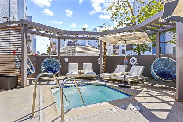Relaxing hot tub at Enclave Apartments