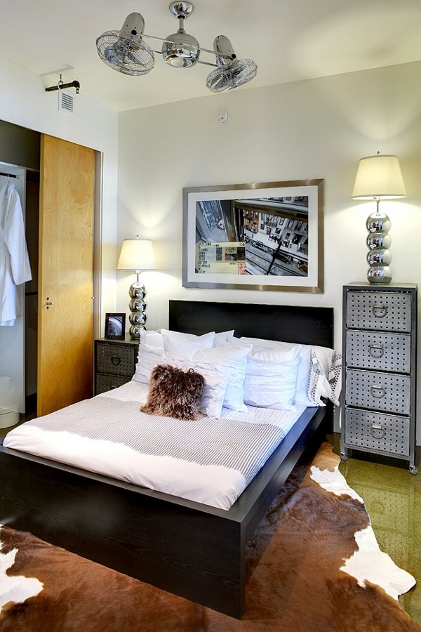 Cozy bedroom with modern design at Potrero Launch Apartments offering luxury living in San Francisco