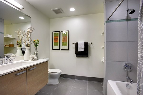 Modern bathroom featuring chic fixtures at Potrero Launch Apartments, luxury living by Greystar in San Francisco