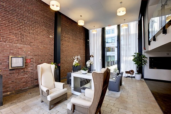 Stylish clubhouse with modern decor at Potrero Launch Apartments offering luxury community space for residents