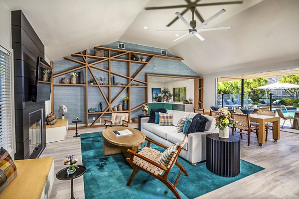Channel Point Apartments: Modern clubhouse featuring luxury design and cozy seating areas
