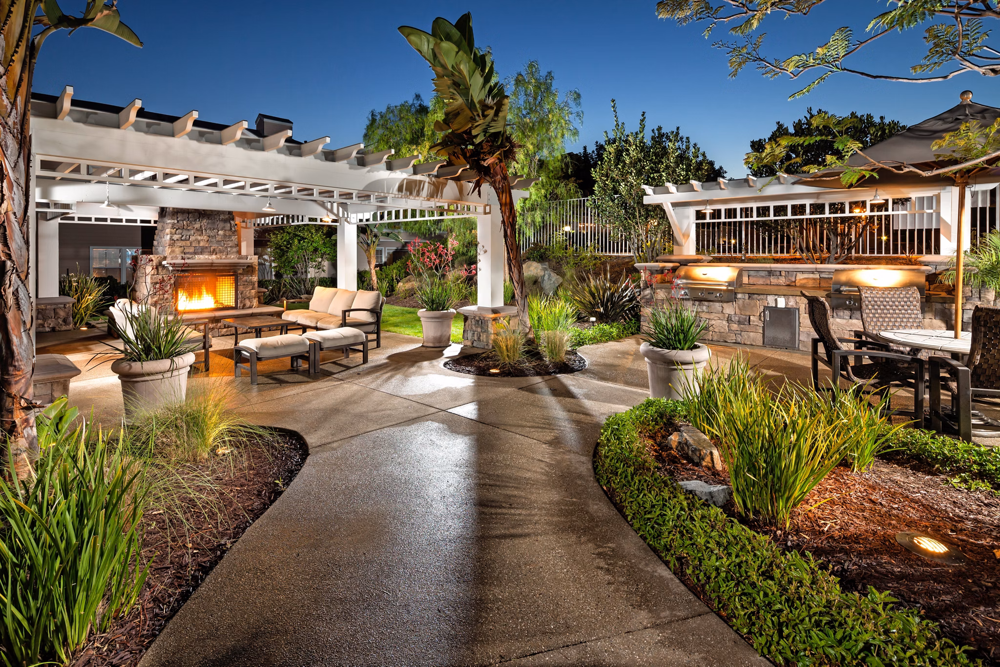 Grill and patio area at Channel Point Apartments with modern outdoor seating